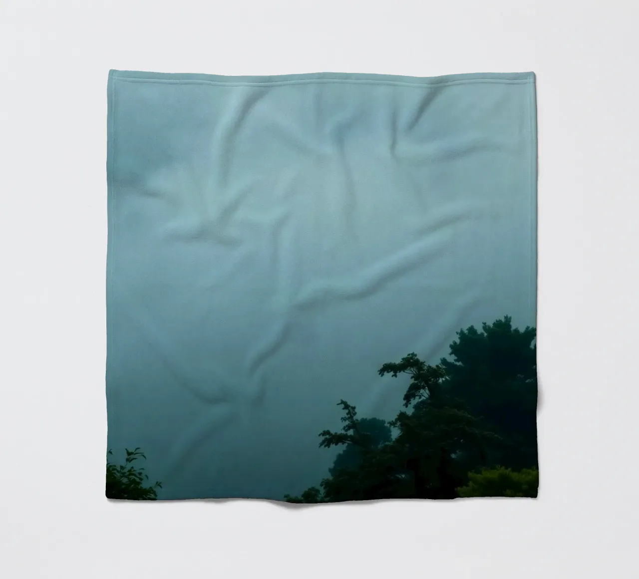 Foggy landscape with trees, creating calming atmosphere fleece blanket by DesignDoodle