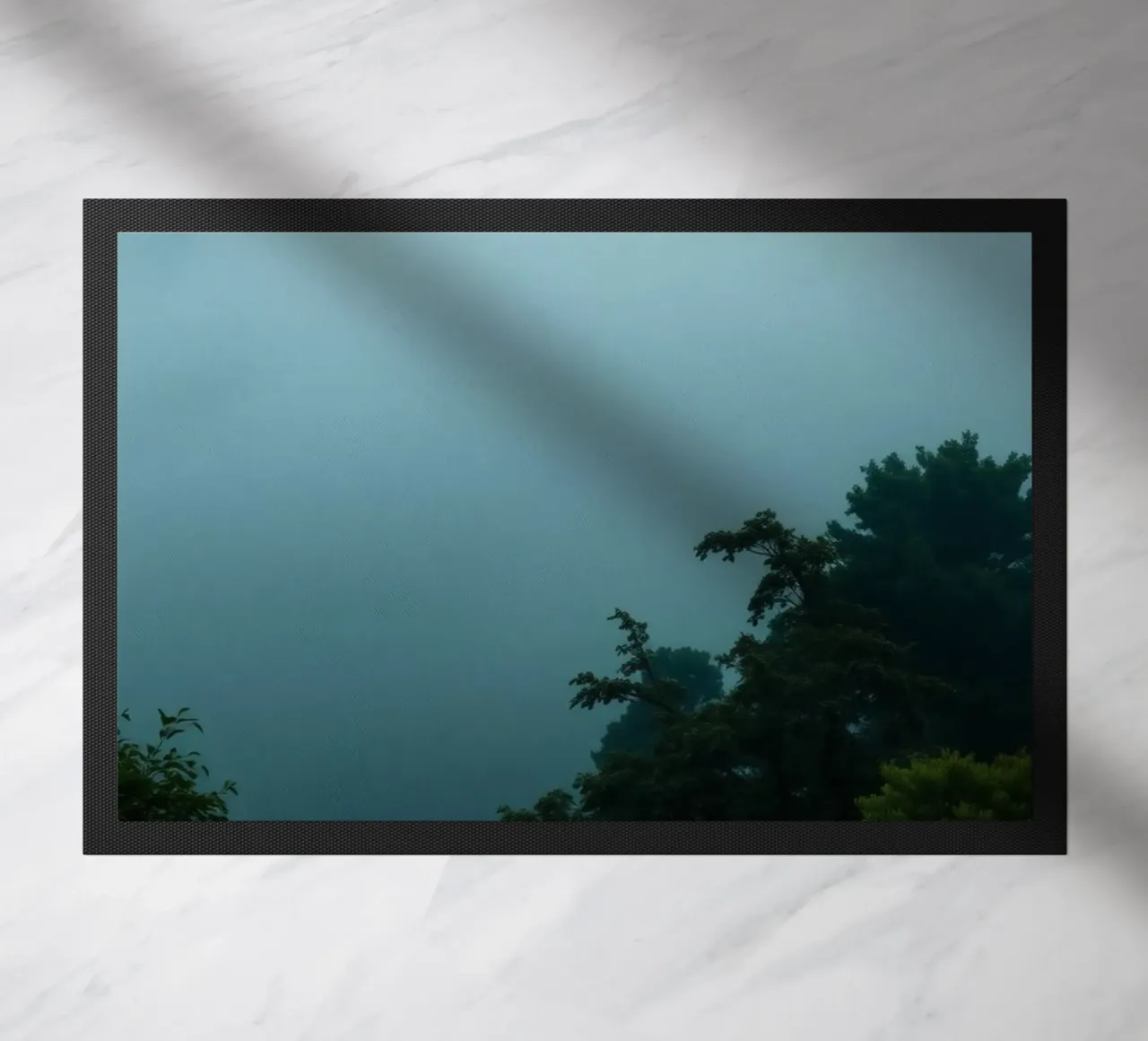 Foggy landscape with trees, creating calming atmosphere doormat by DesignDoodle