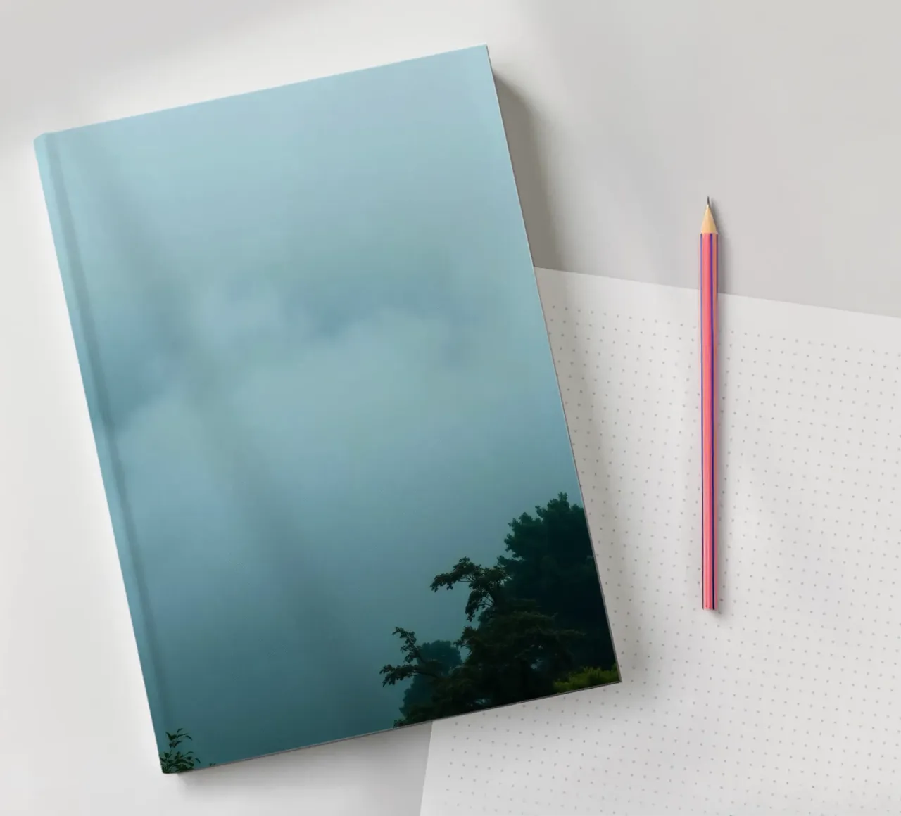 Foggy landscape with trees, creating calming atmosphere notebook by DesignDoodle