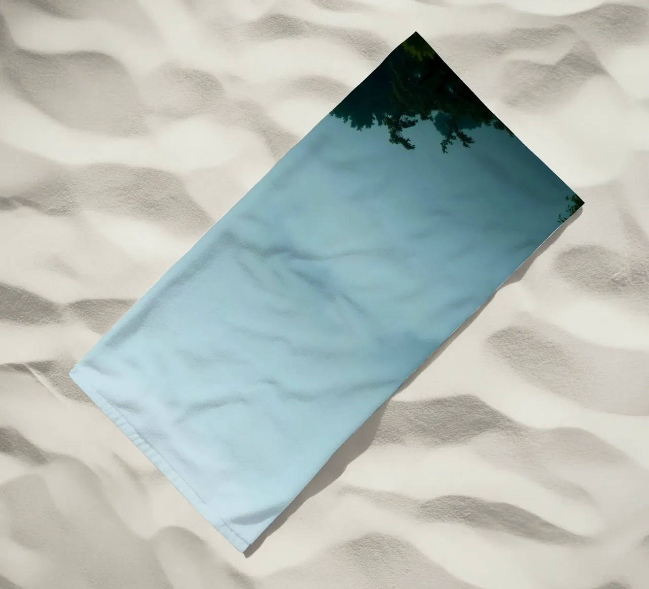 Foggy landscape with trees, creating calming atmosphere beach towel by DesignDoodle