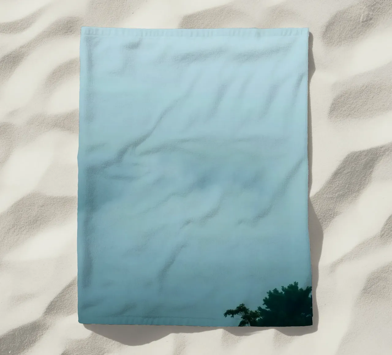 Foggy landscape with trees, creating calming atmosphere beach towel by DesignDoodle