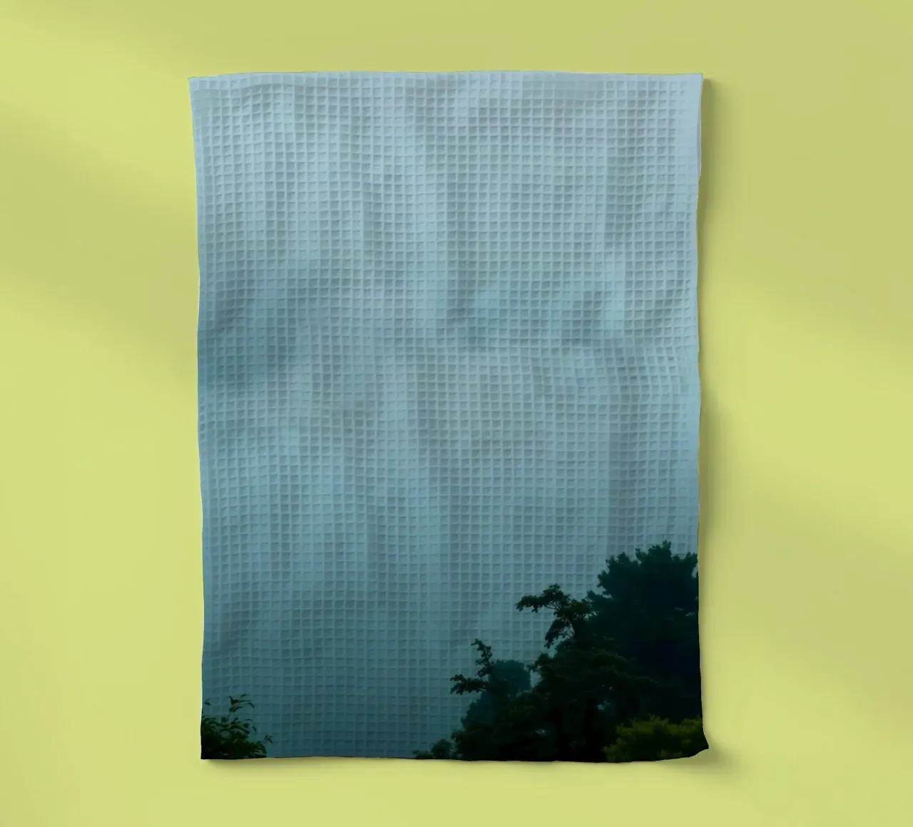 Foggy landscape with trees, creating calming atmosphere tea towel by DesignDoodle