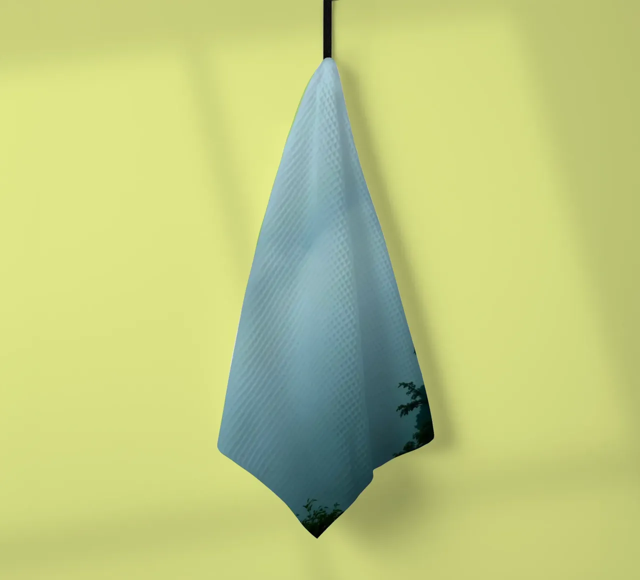 Foggy landscape with trees, creating calming atmosphere tea towel by DesignDoodle