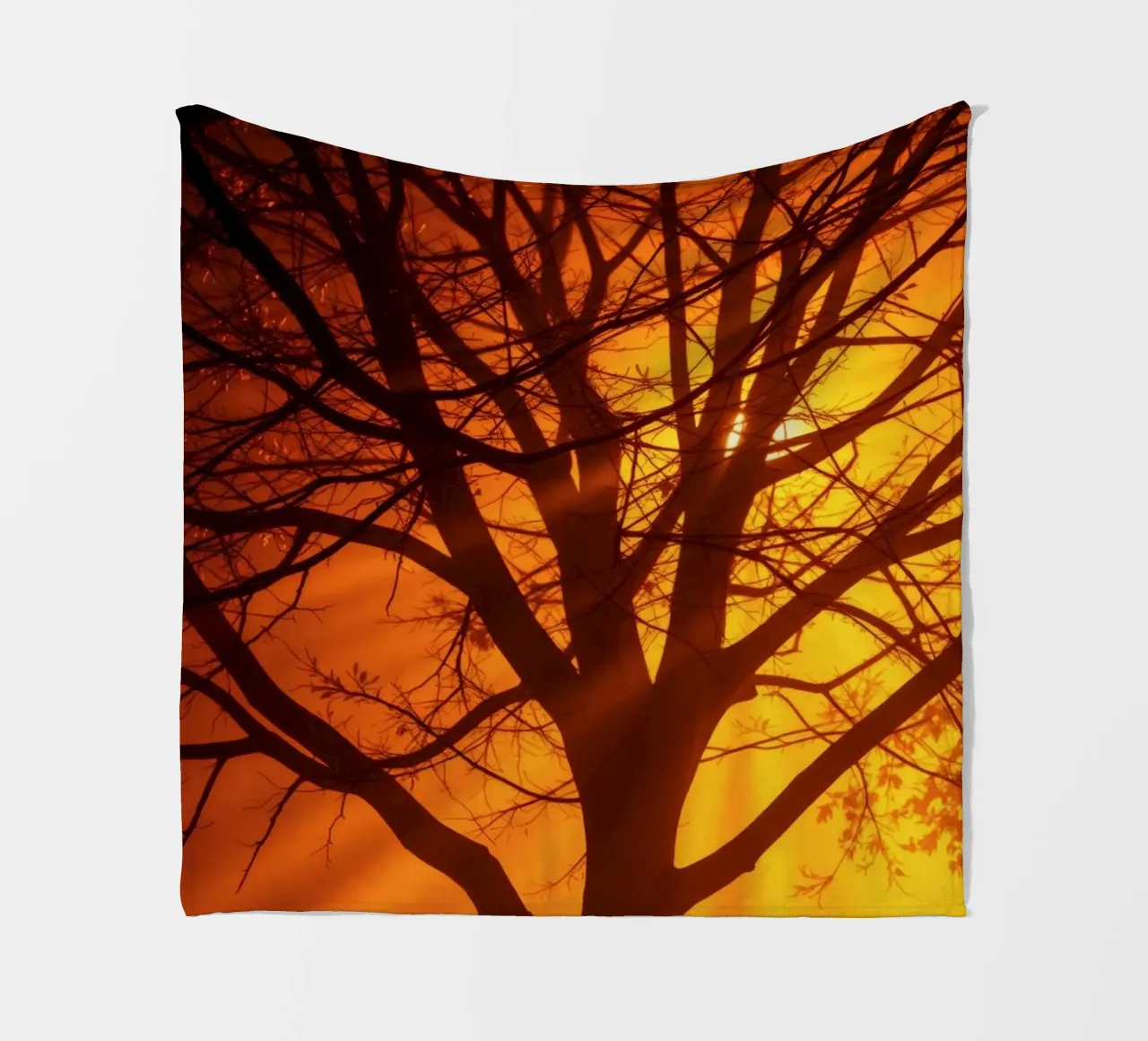 silhouette of a tree against a vibrant orange background wit fleece blanket by DesignDoodle