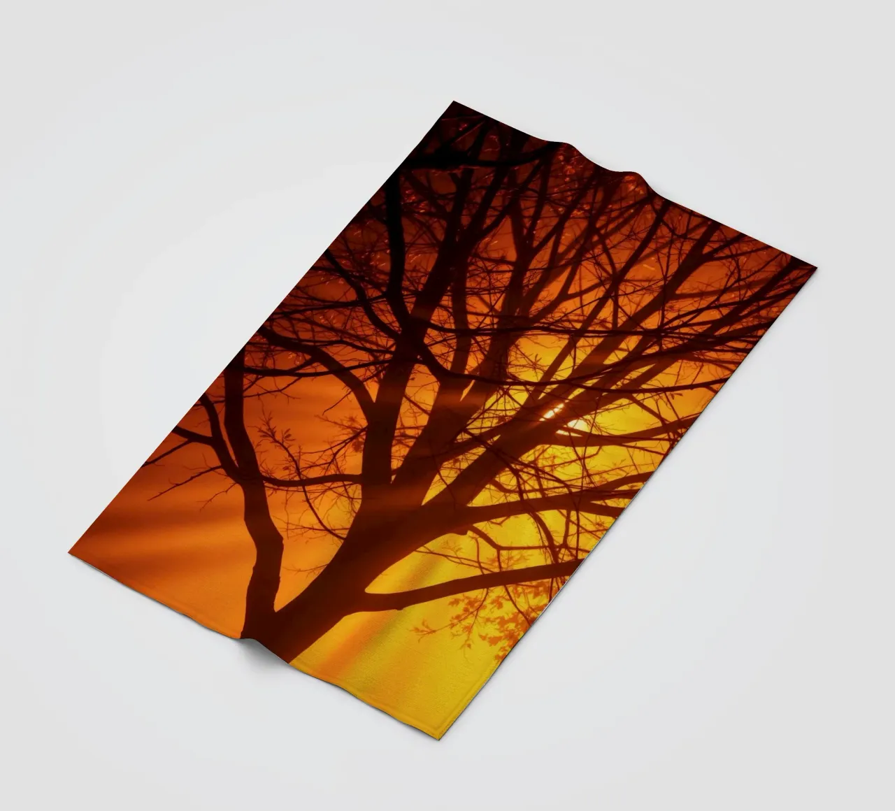 silhouette of a tree against a vibrant orange background wit fleece blanket by DesignDoodle