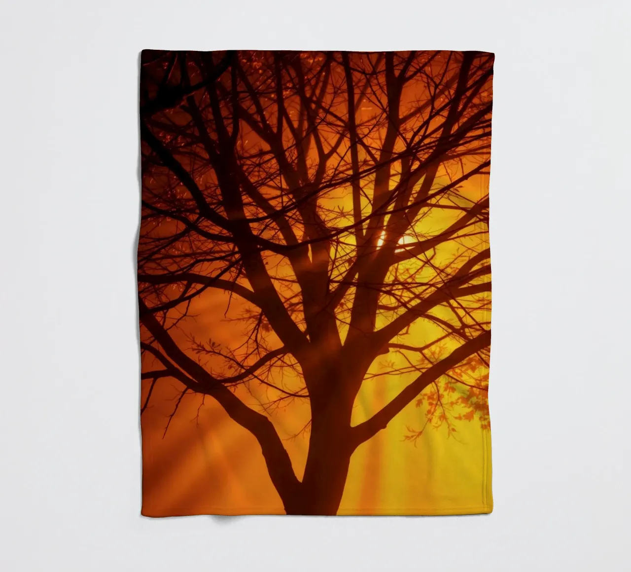 silhouette of a tree against a vibrant orange background wit fleece blanket by DesignDoodle