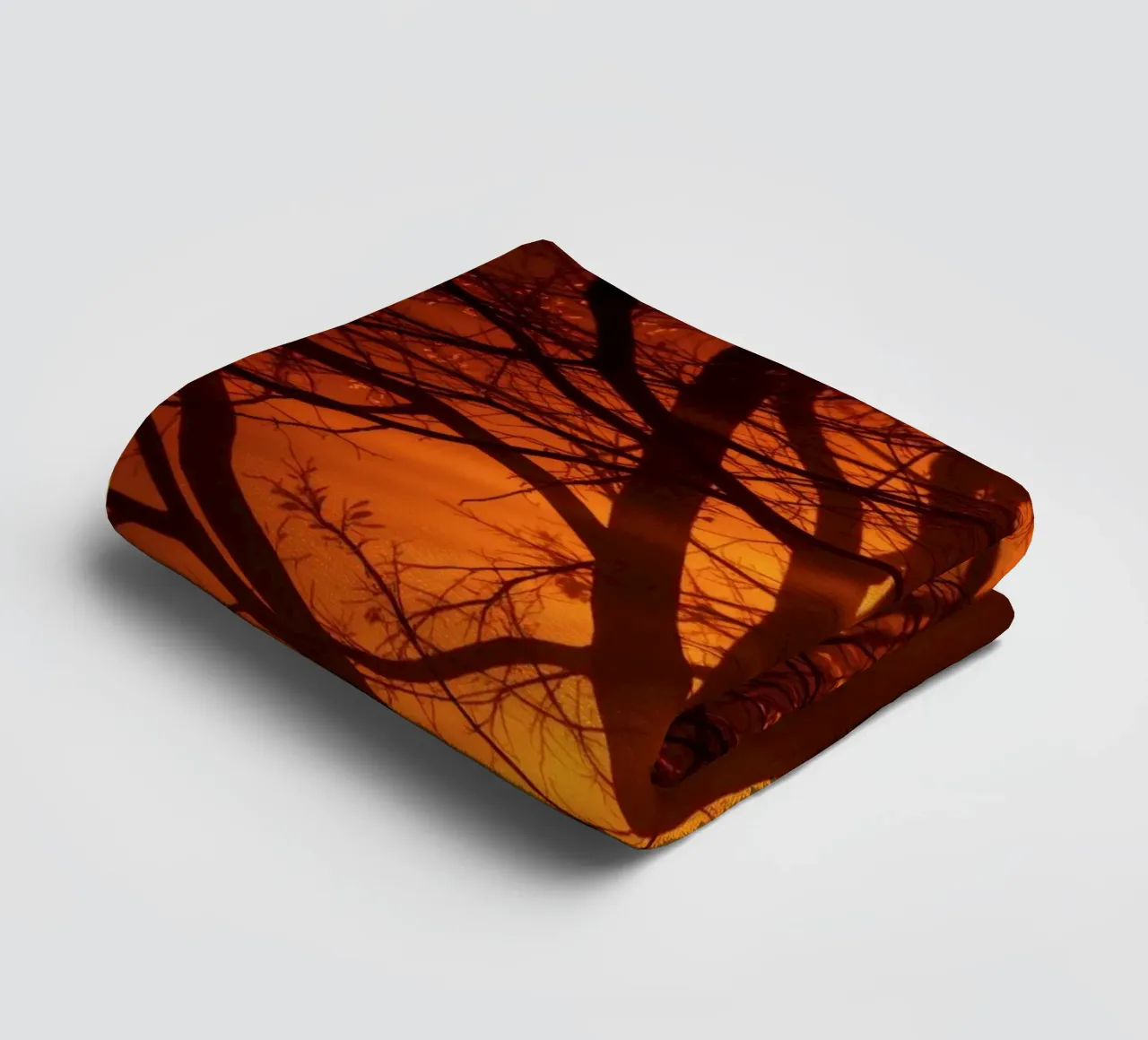 silhouette of a tree against a vibrant orange background wit towel by DesignDoodle
