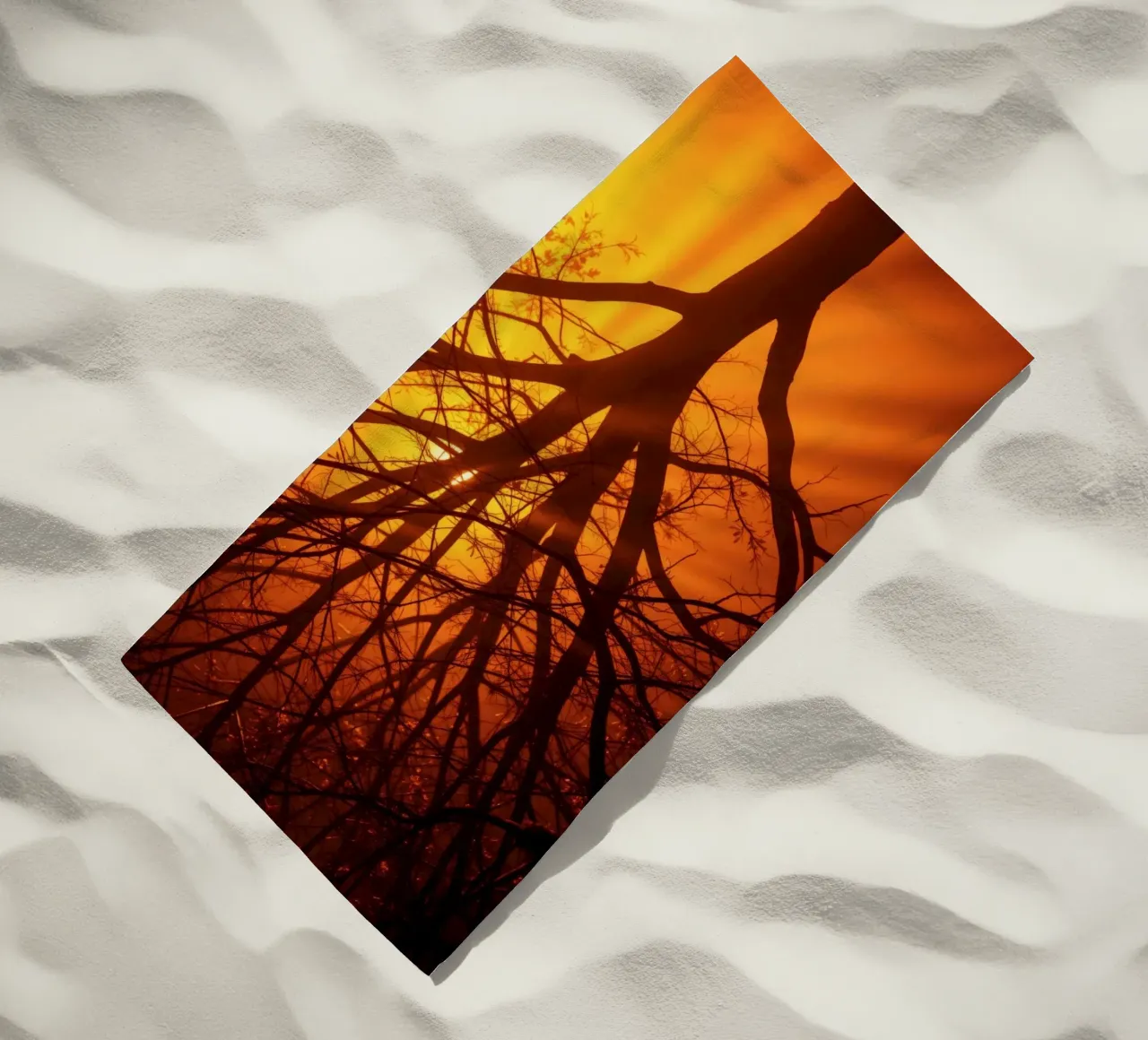 silhouette of a tree against a vibrant orange background wit beach towel by DesignDoodle