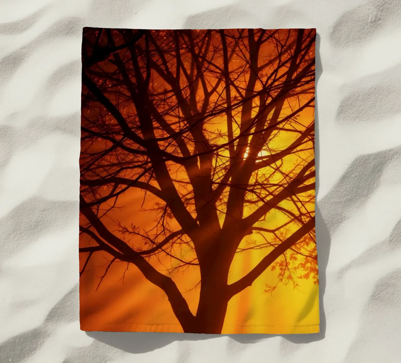 silhouette of a tree against a vibrant orange background wit beach towel by DesignDoodle
