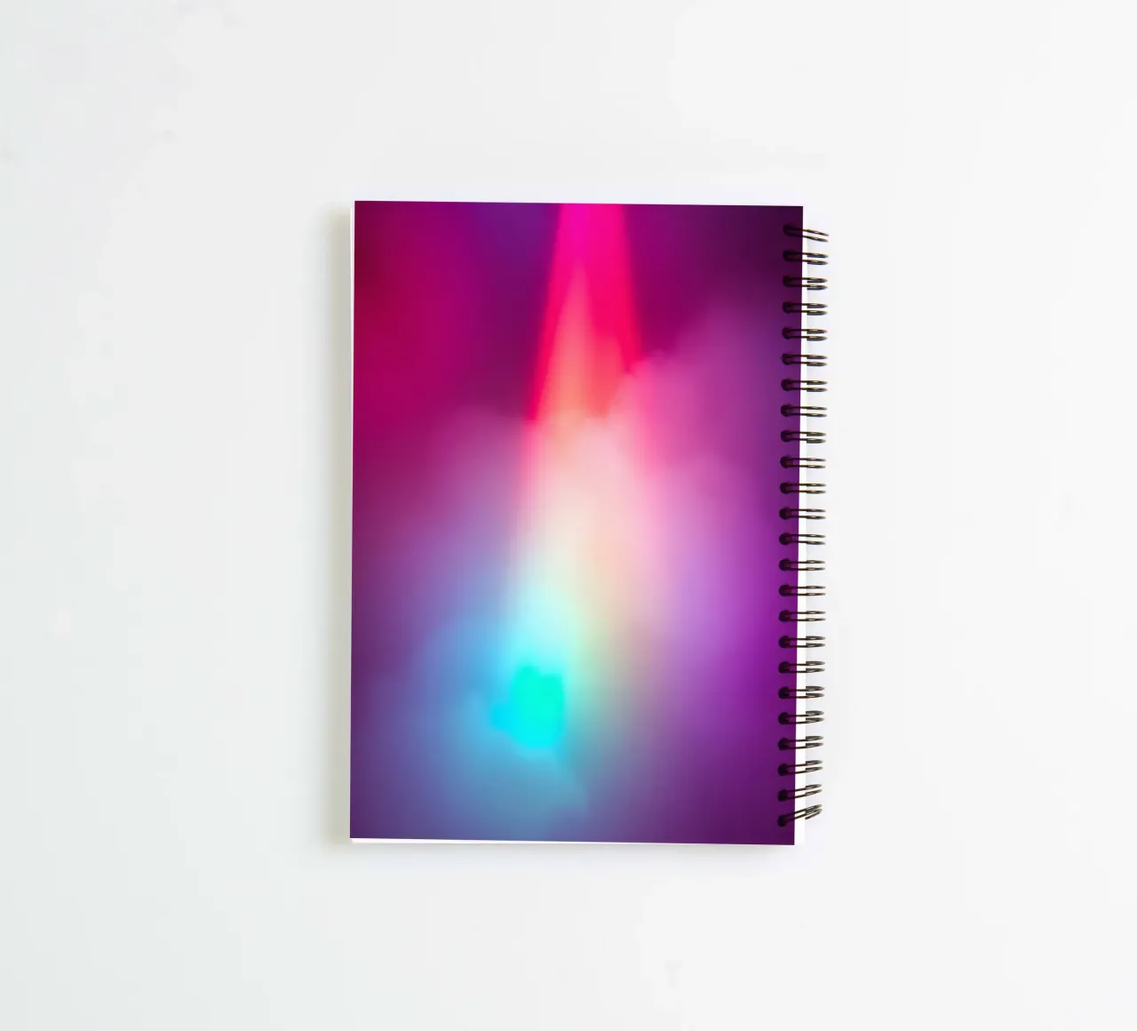 Vibrant abstract light display with colorful gradients spiral notebook by DesignDoodle