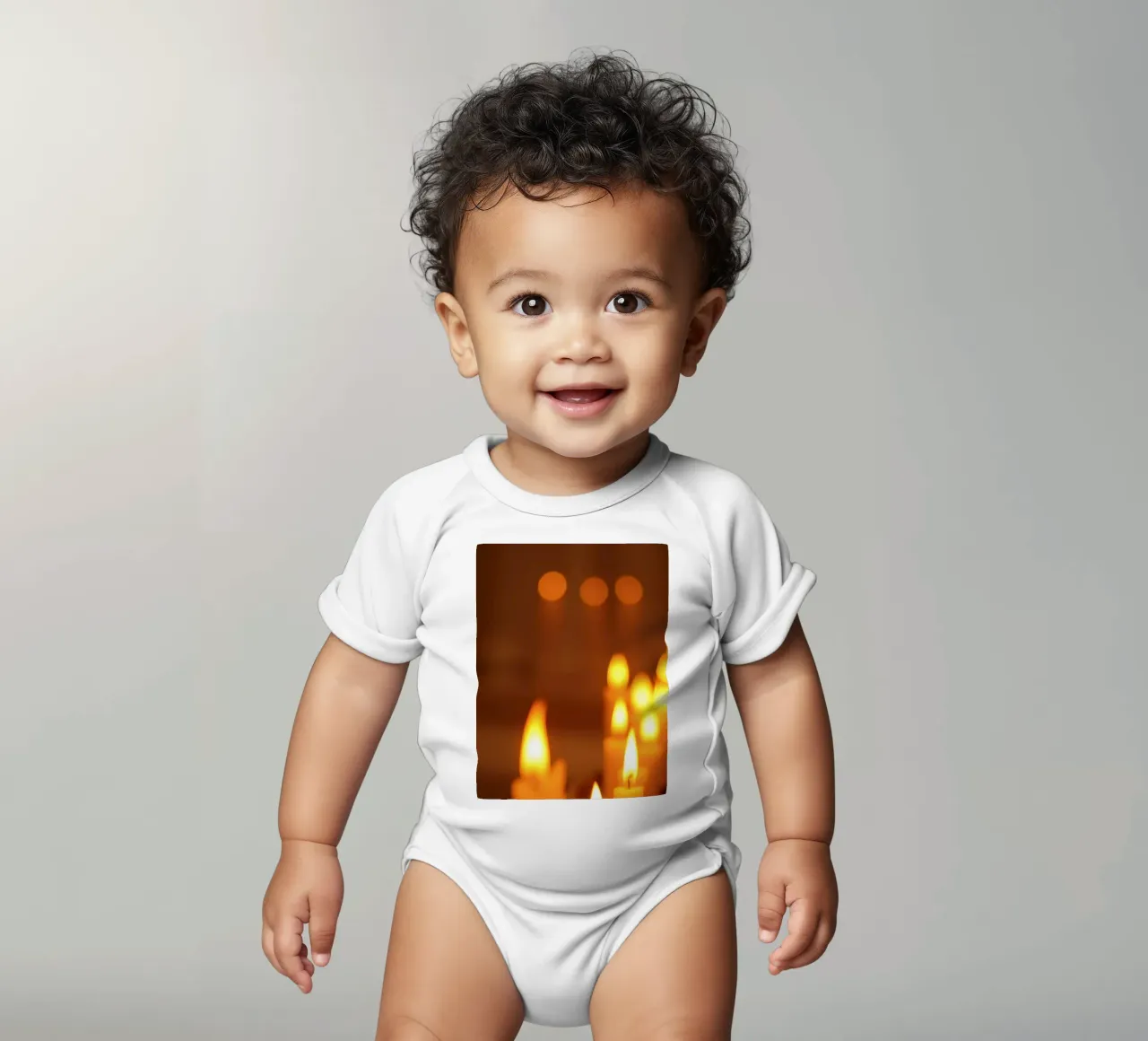 Soft glow of flickering candle flames calming atmospher short-sleeve baby romper by DesignDoodle