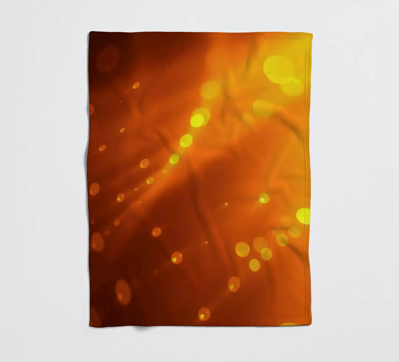 raggi di luce arancione incandescente ed effetti bokeh coperta in pile da DesignDoodle