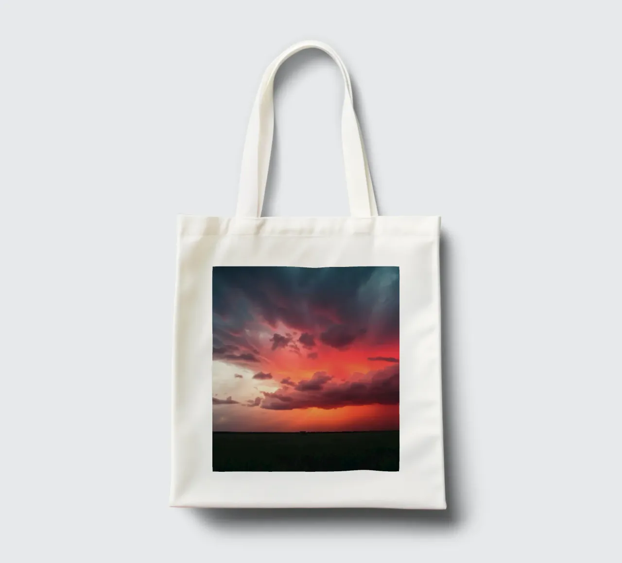 Un fondo que representa el cielo con colores complementarios tote bag de DesignDoodle