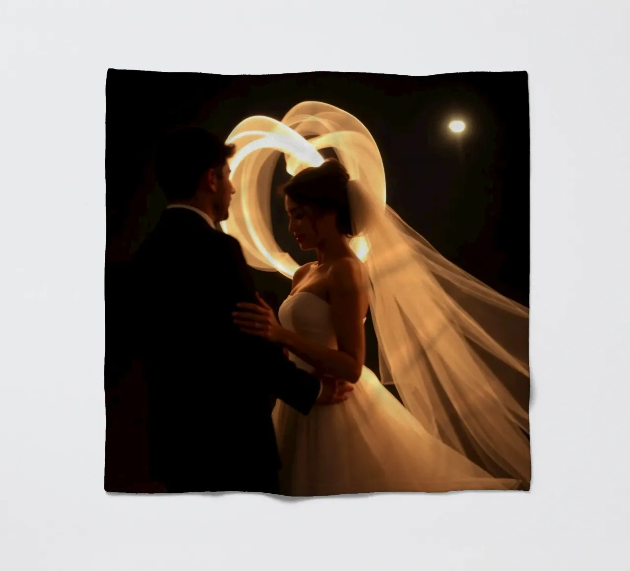 Couple shares a romantic moment with glowing veil fleece blanket by DesignDoodle