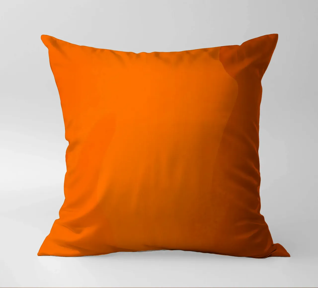 orange abstract design featuring leaf motifs and smooth art decorative cushion by DesignDoodle