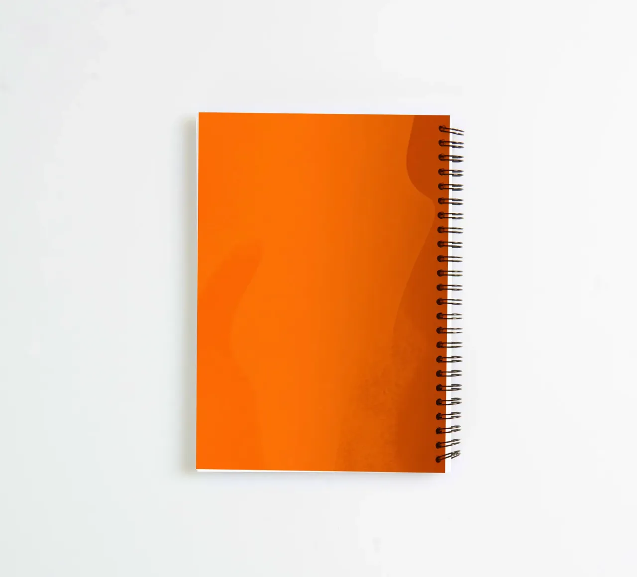 orange abstract design featuring leaf motifs and smooth art spiral notebook by DesignDoodle
