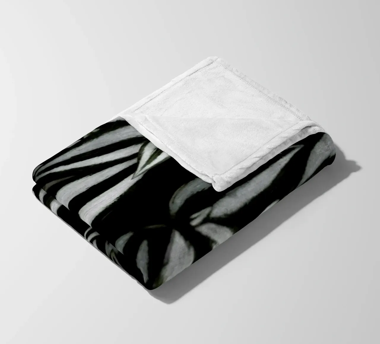 Botanical Cebra Leafs fleece blanket by Studio Nahili