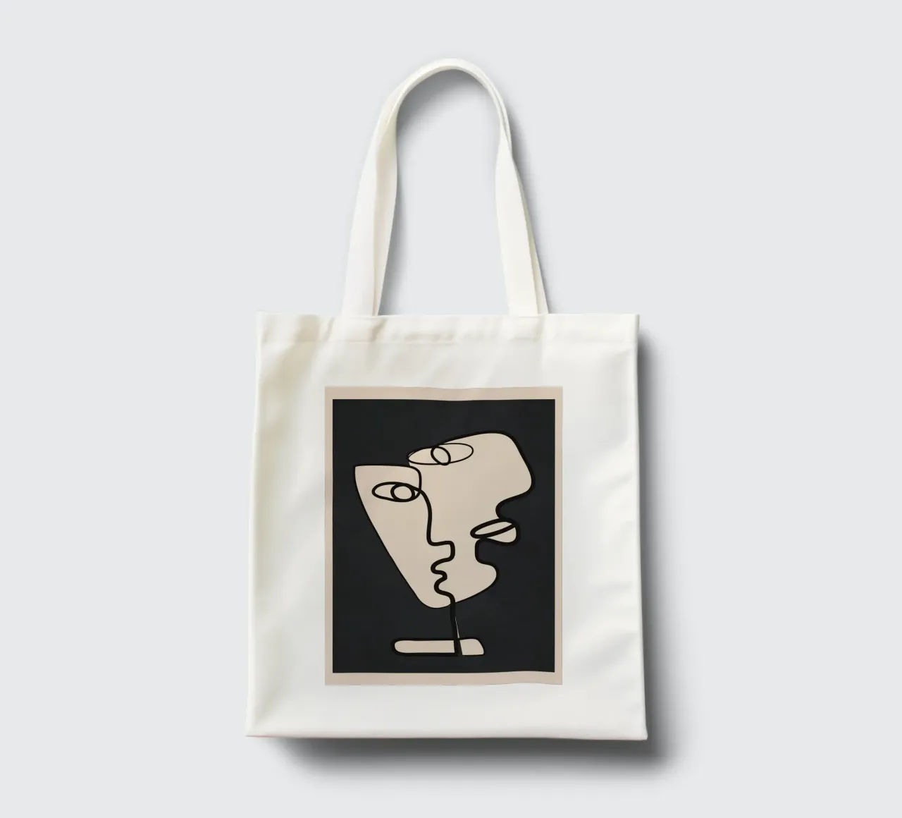 Interwoven Faces 1 tote bag by Nadjaa