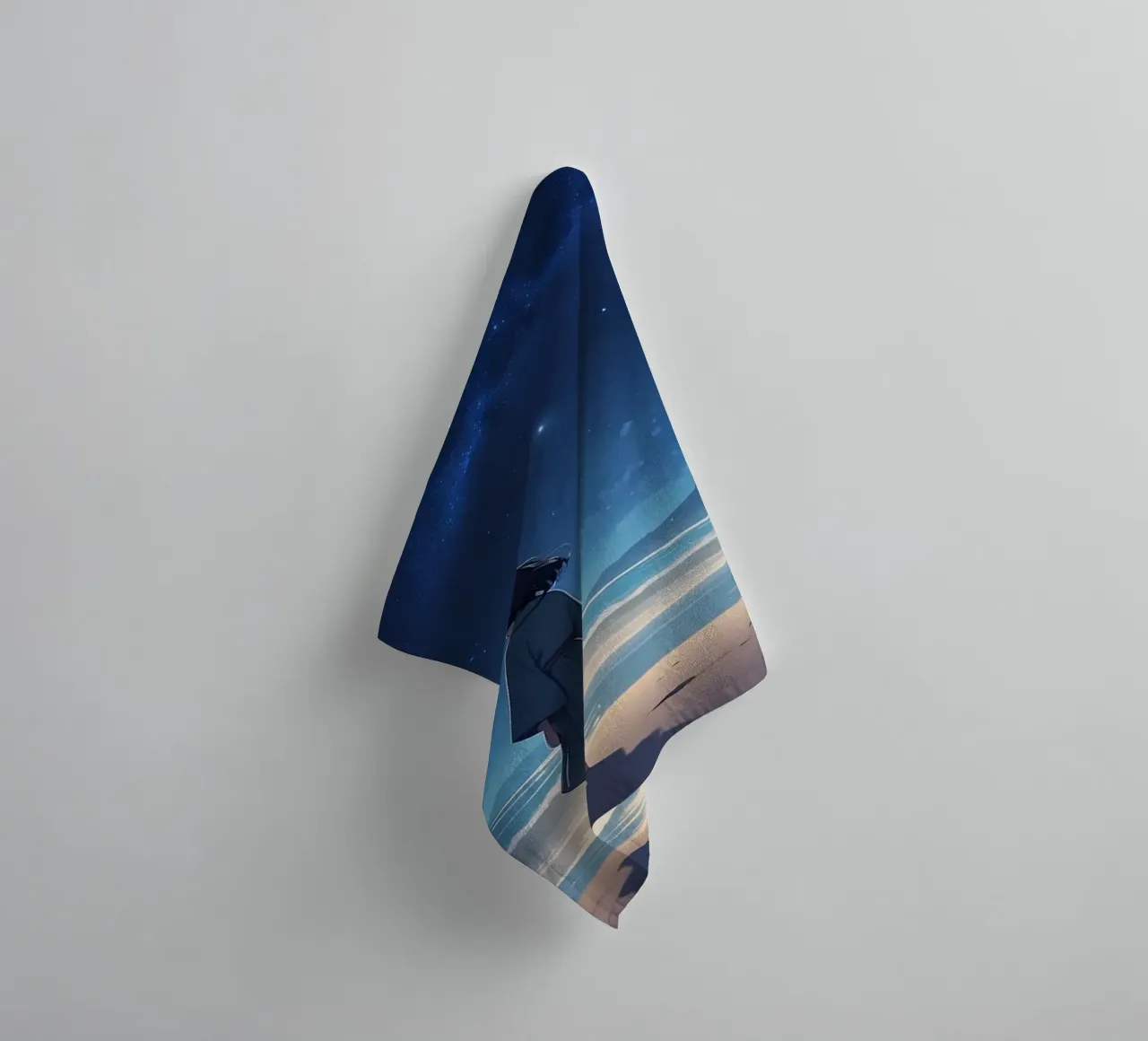 Une jeune fille regarde le ciel étoilé depuis une plage de sable. serviette de bain de DesignDoodle