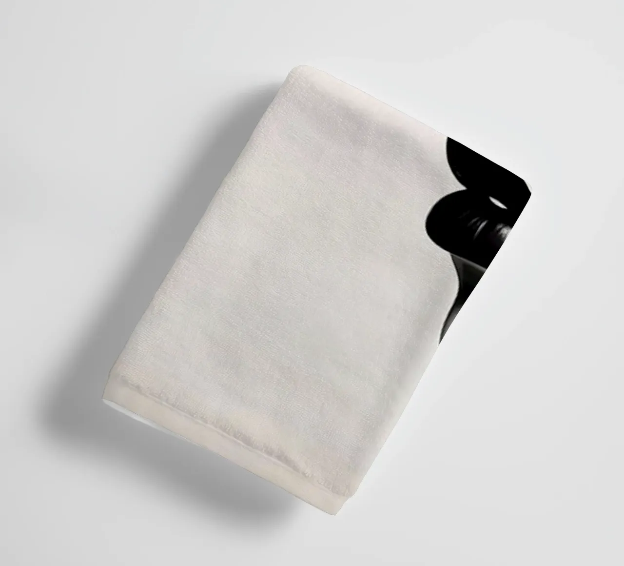 Two elegant faces in profile showcasing intricate line art towel by DesignDoodle