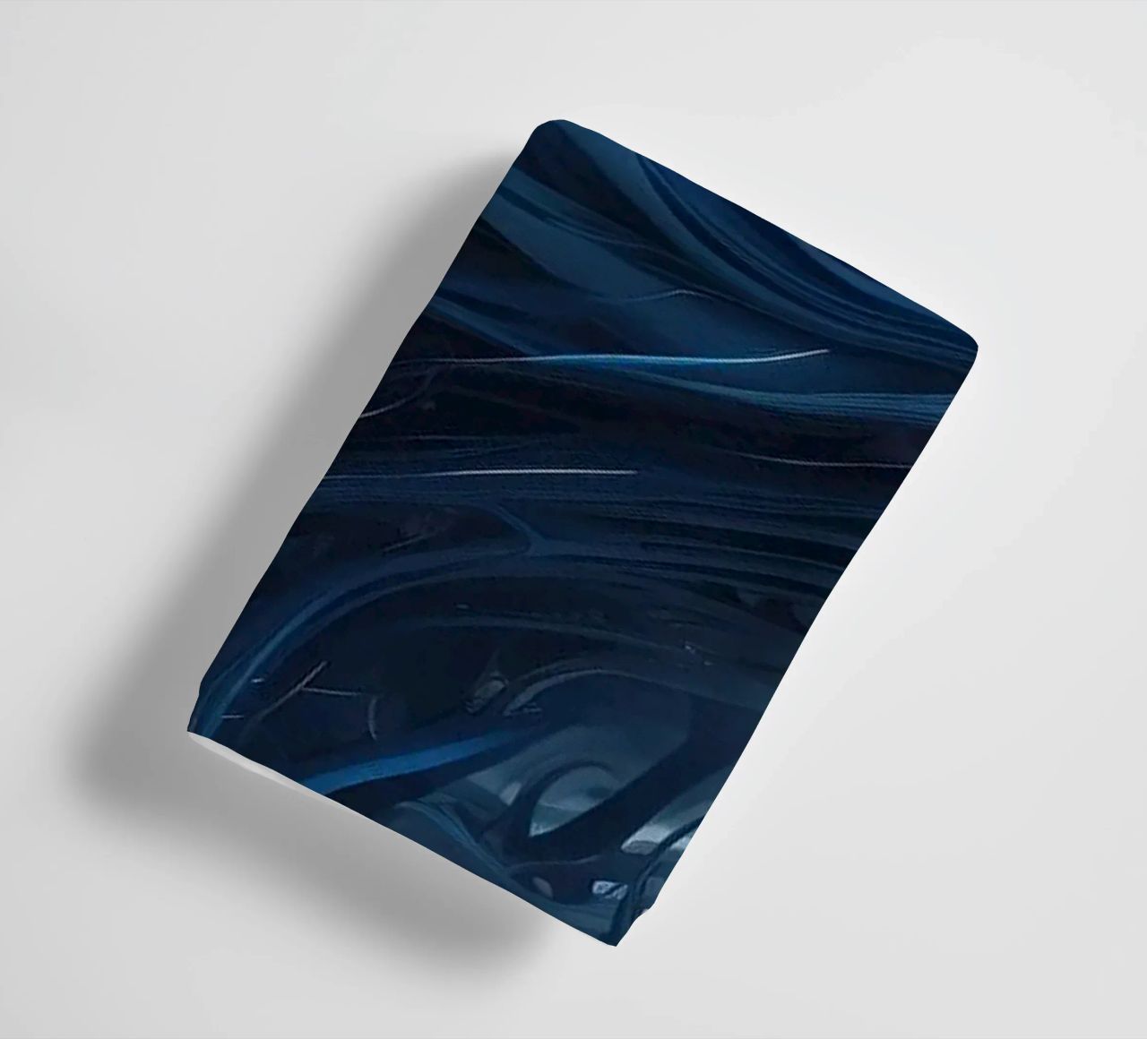 Flowing blues create an abstract wave effect in dynamic art towel by DesignDoodle
