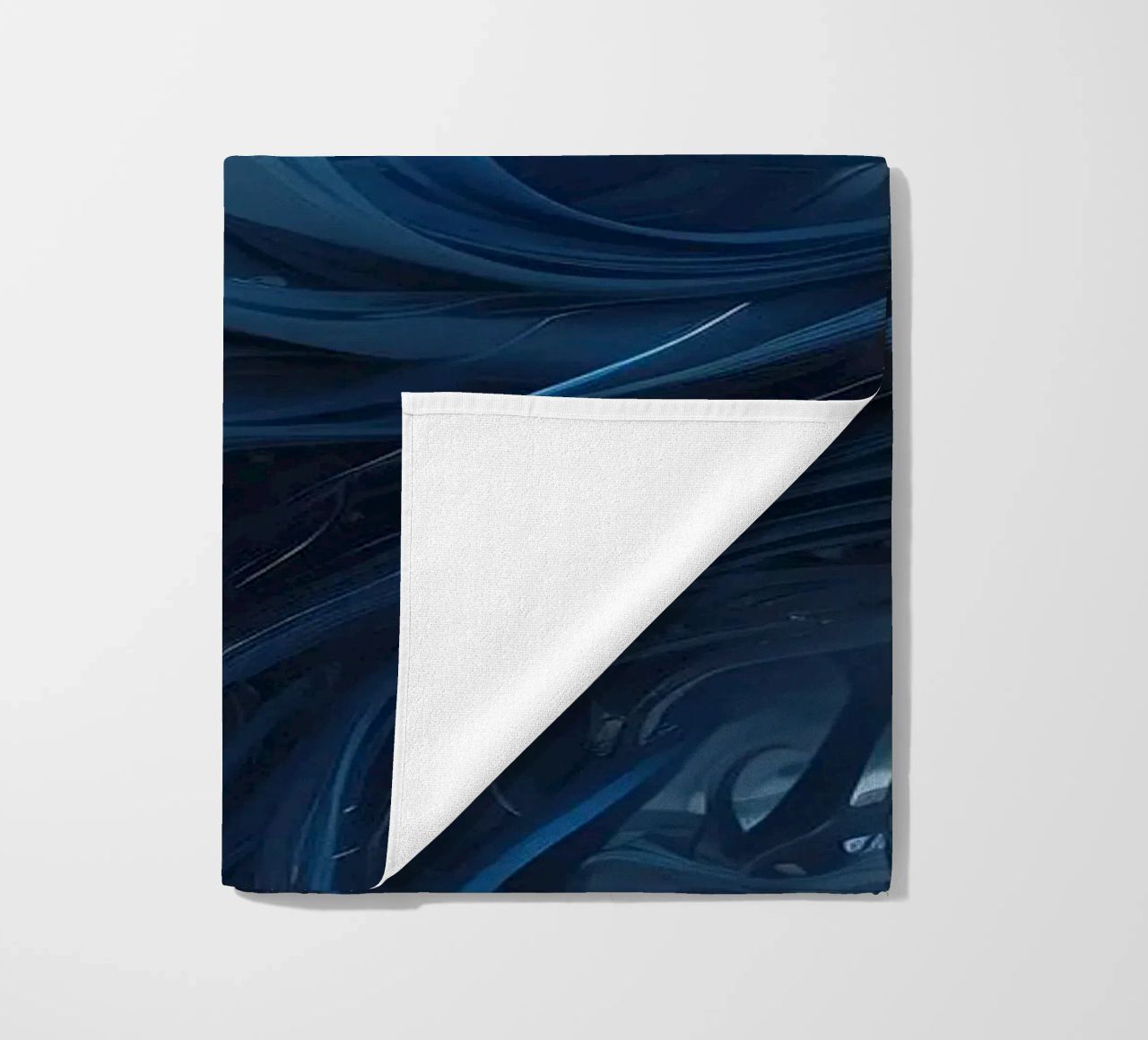 Flowing blues create an abstract wave effect in dynamic art beach towel by DesignDoodle