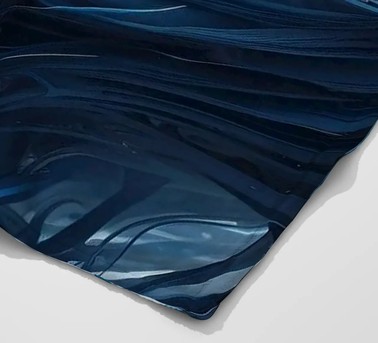 Flowing blues create an abstract wave effect in dynamic art fleece blanket by DesignDoodle