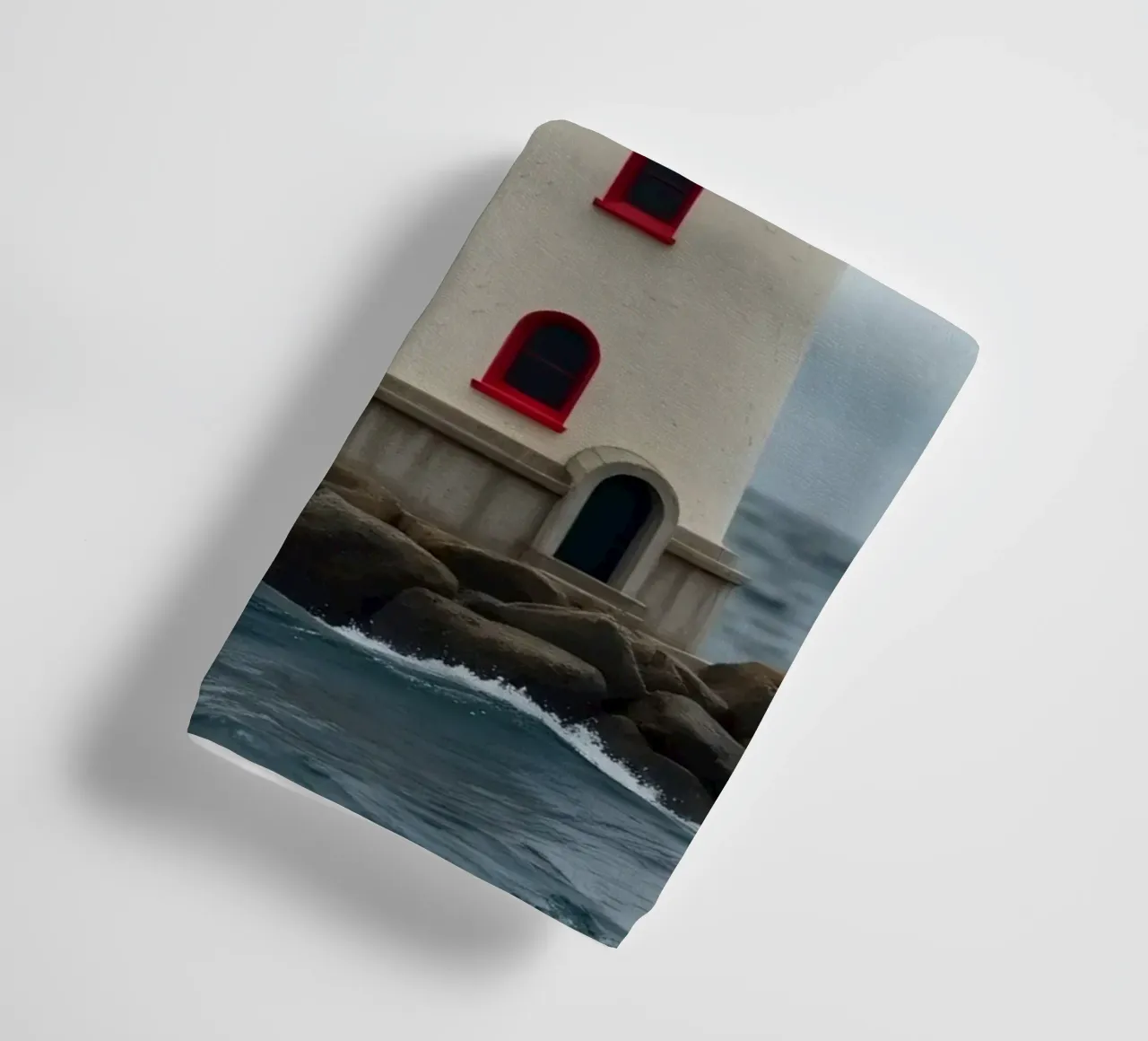Leuchtturm an der Küste ragt aus dem stürmischen Himmel Handtuch von DesignDoodle