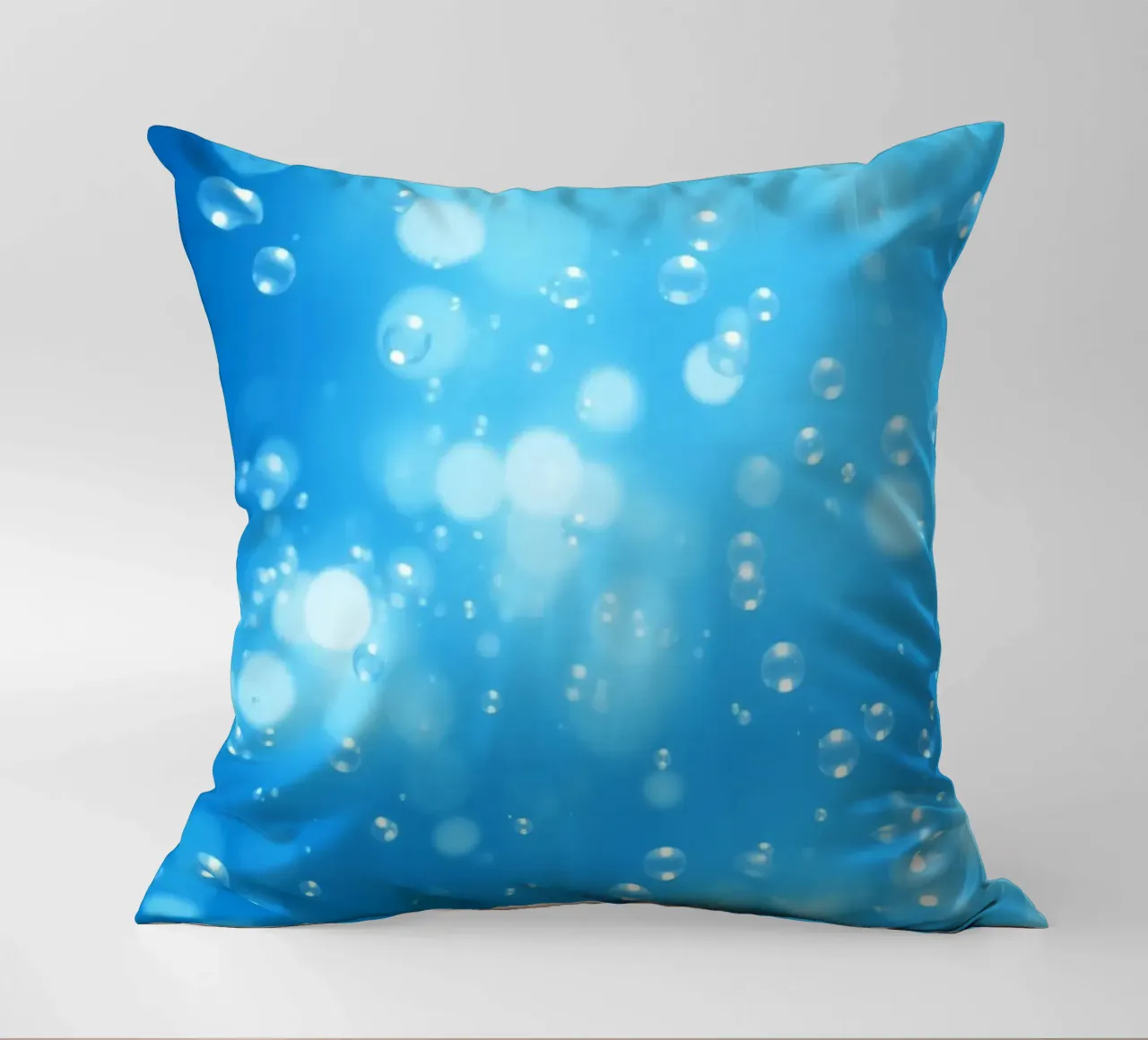 Bubbles floating in clear blue water creating calm art decorative cushion by DesignDoodle