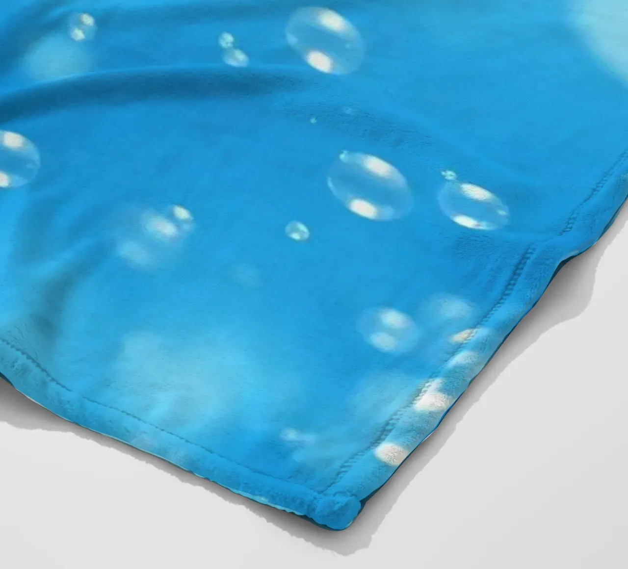 Bubbles floating in clear blue water creating calm art fleece blanket by DesignDoodle
