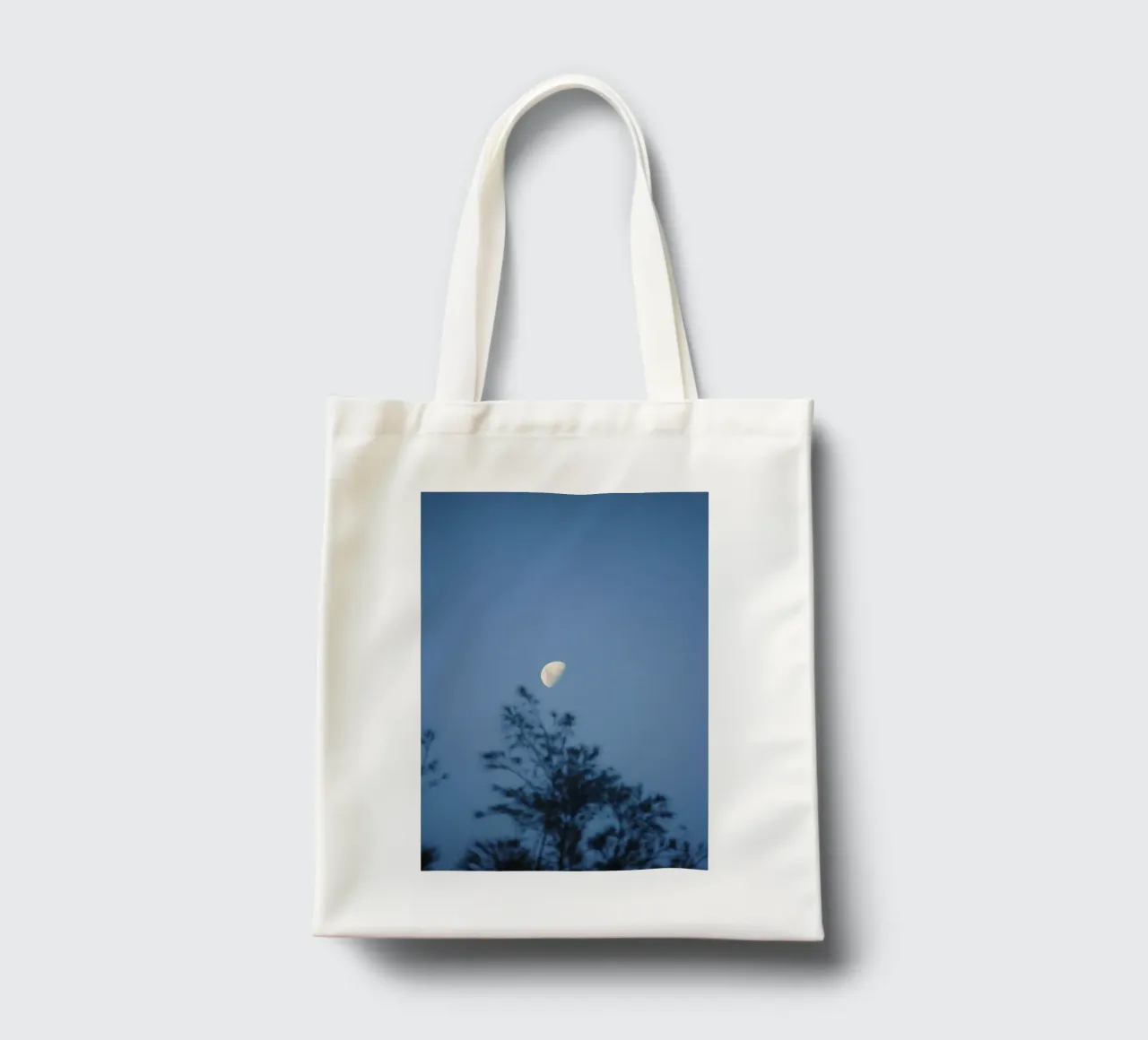 branches sky tote bag by Bleu