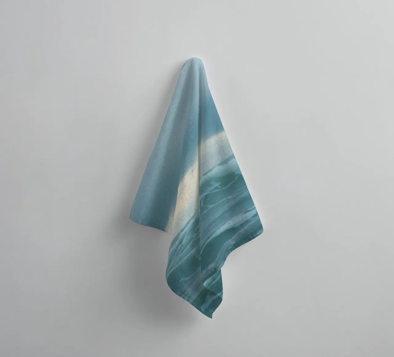 Waves crash against the shore under dark clouds at twilight towel by DesignDoodle