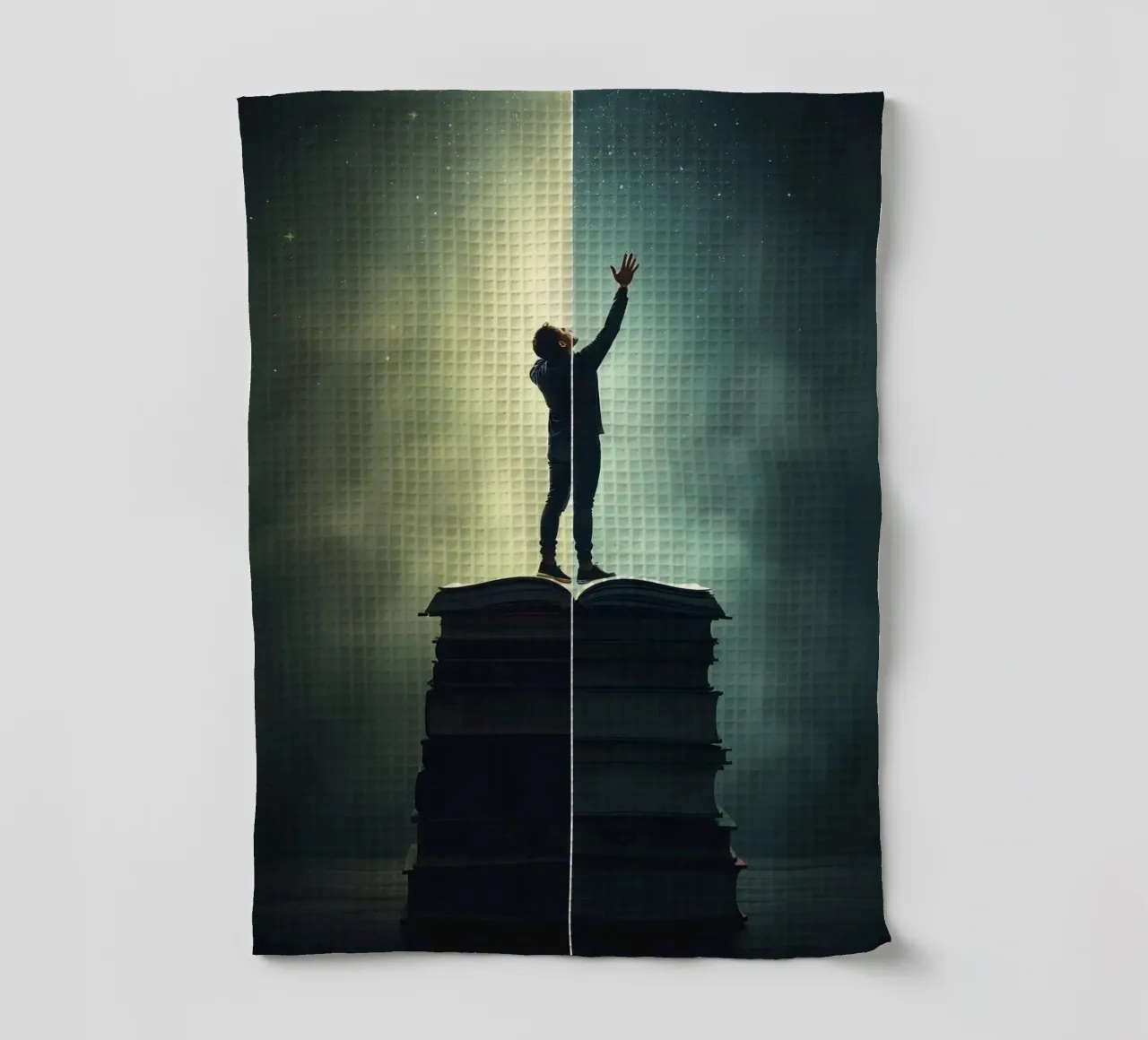 man reaches for stars while standing on a stack of books tea towel by DesignDoodle