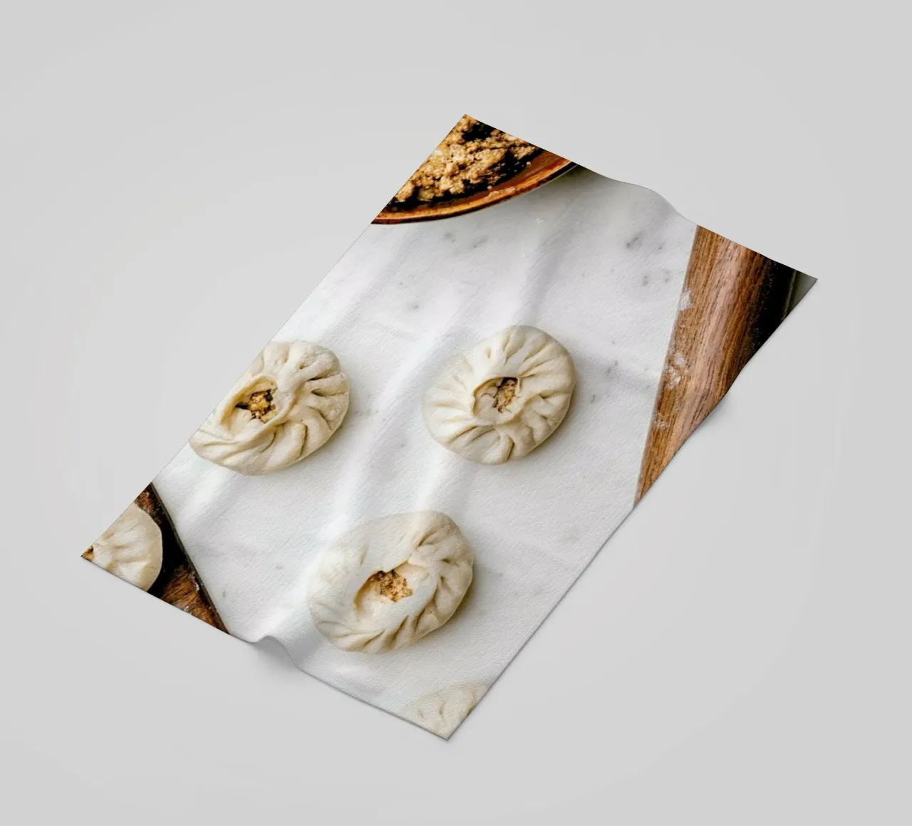 Baozi In The Making beach towel by Eat this