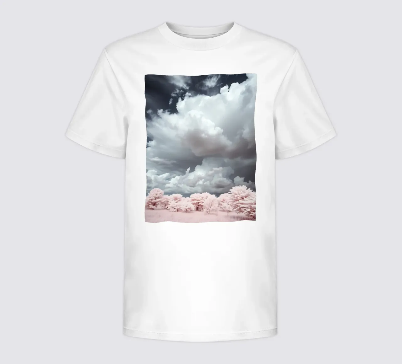 Dramatic clouds hover over pink-tinted trees in an enchantin kids t-shirt by DesignDoodle