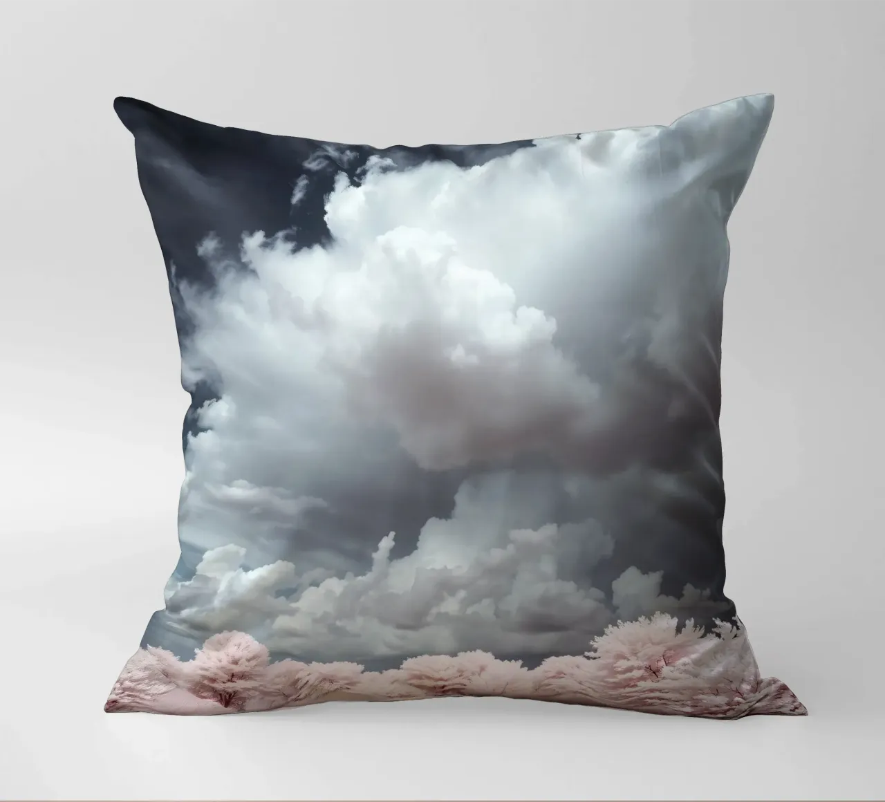 Dramatic clouds hover over pink-tinted trees in an enchantin decorative cushion by DesignDoodle