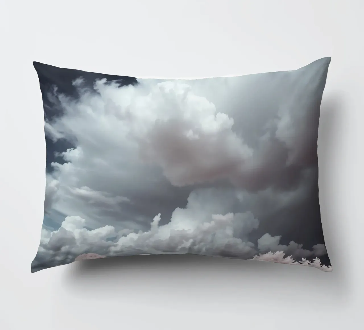Dramatic clouds hover over pink-tinted trees in an enchantin decorative cushion by DesignDoodle