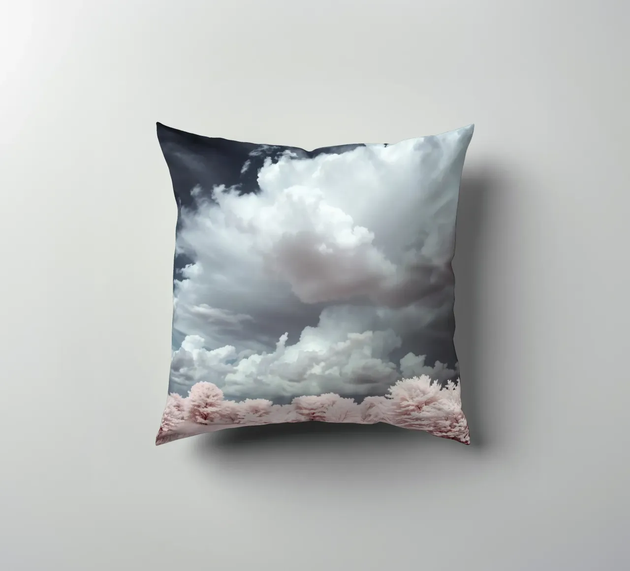 Dramatic clouds hover over pink-tinted trees in an enchantin decorative cushion by DesignDoodle