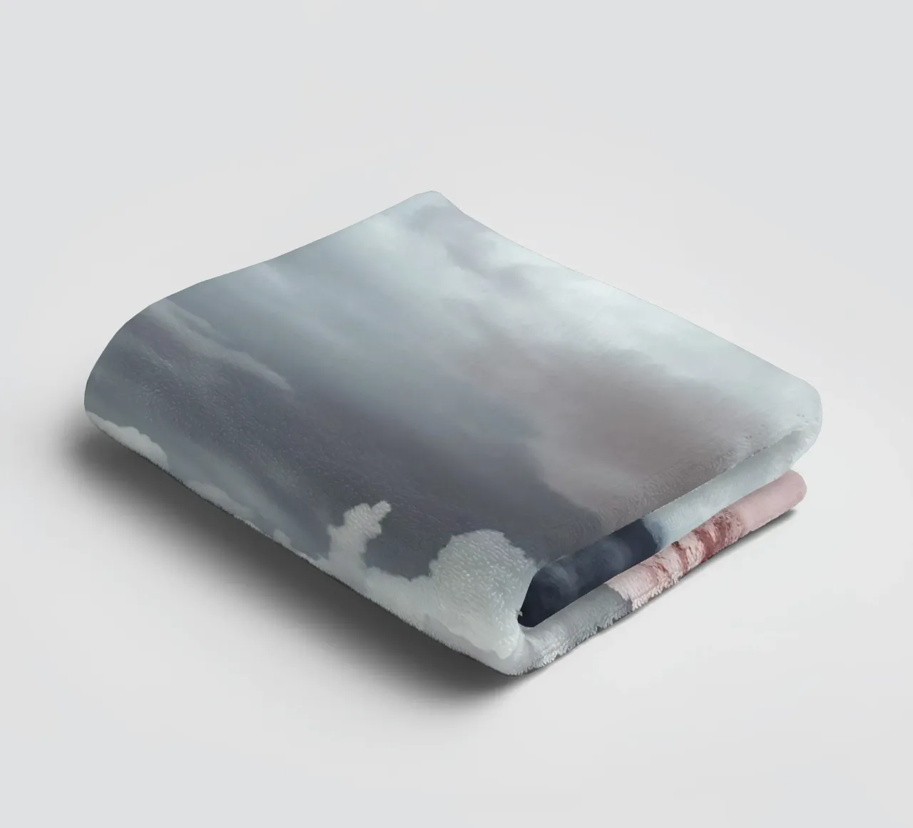 Dramatic clouds hover over pink-tinted trees in an enchantin towel by DesignDoodle