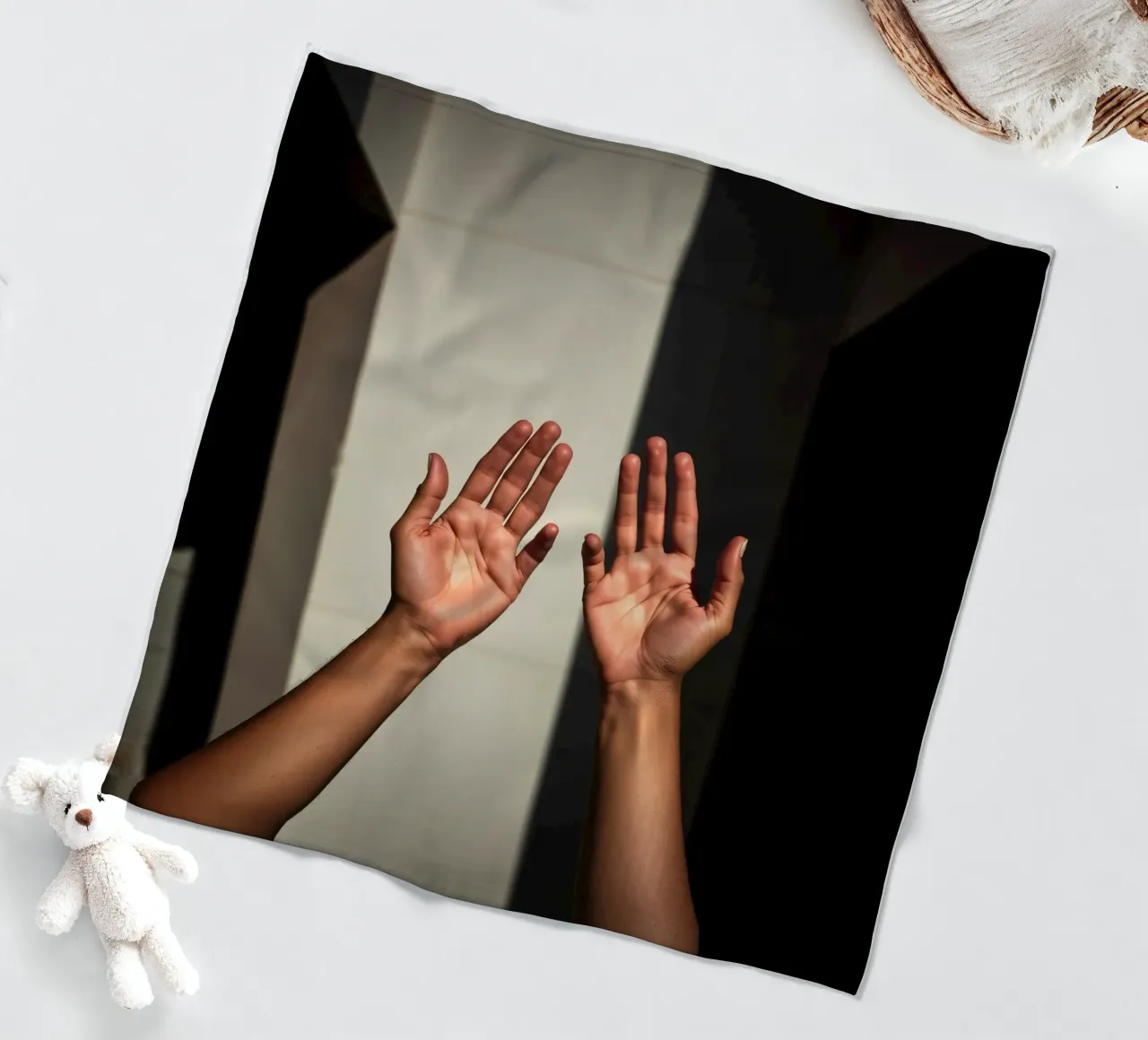 Hands reaching towards light in a minimalist setting fleece blanket by DesignDoodle