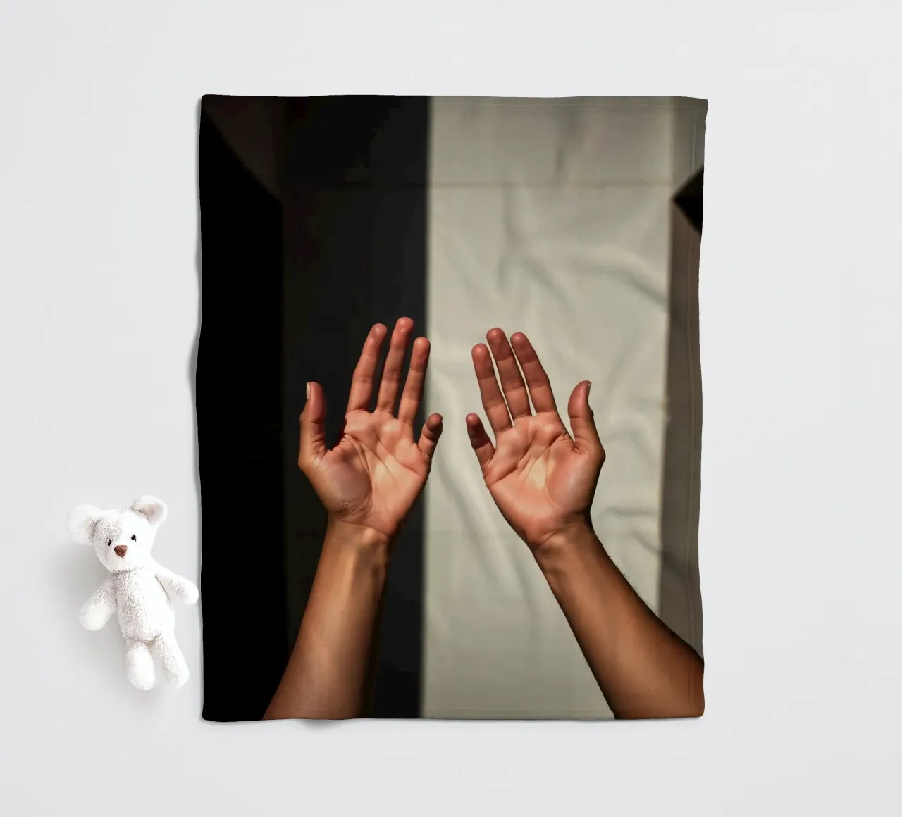 Hands reaching towards light in a minimalist setting fleece blanket by DesignDoodle