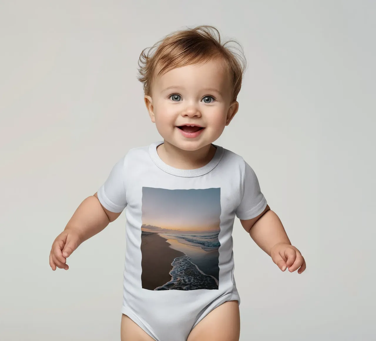 Serene beach at sunset with gentle waves lapping at the shor short-sleeve baby romper by DesignDoodle