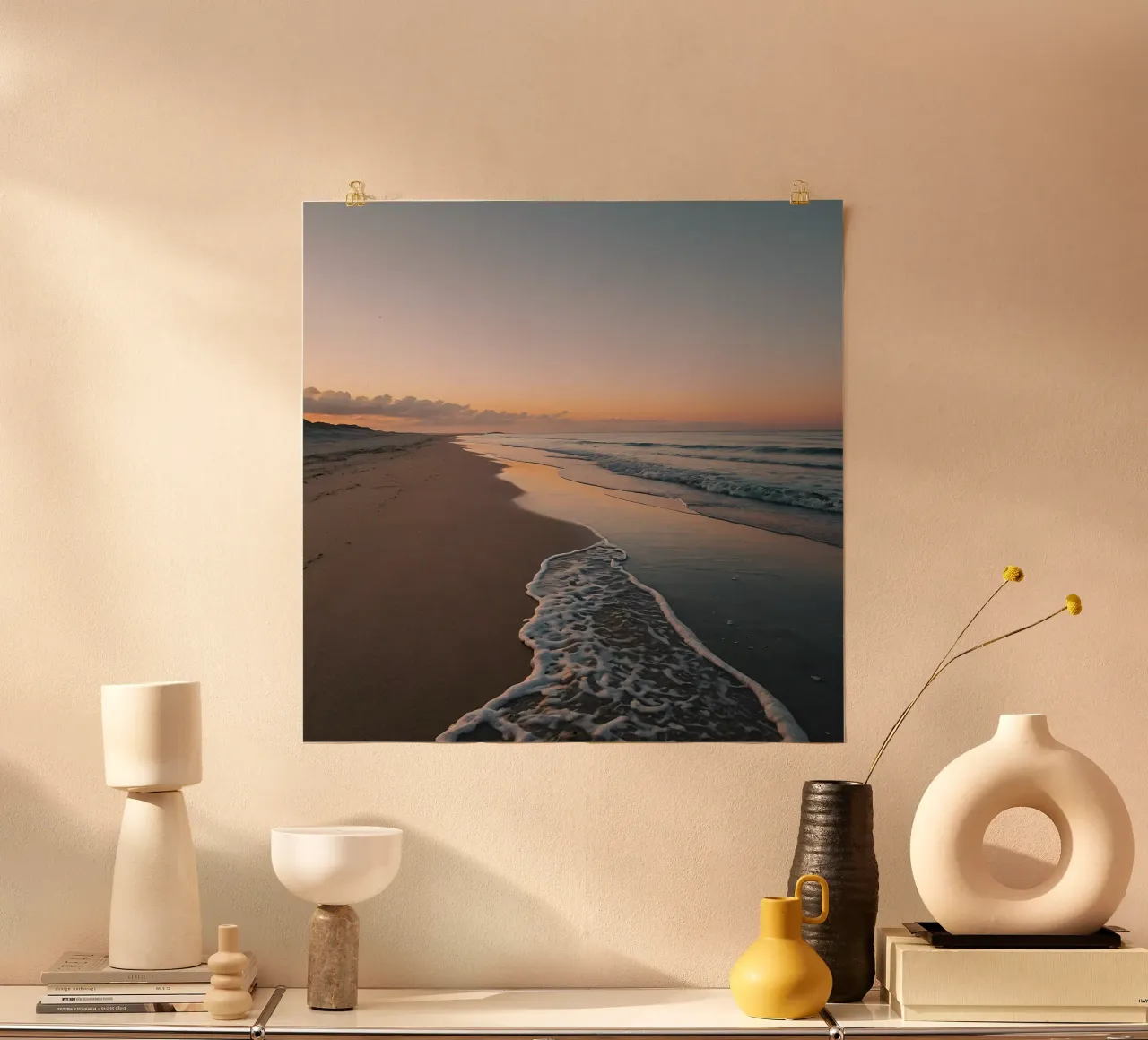 Serene beach at sunset with gentle waves lapping at the shor hahnemühle by DesignDoodle