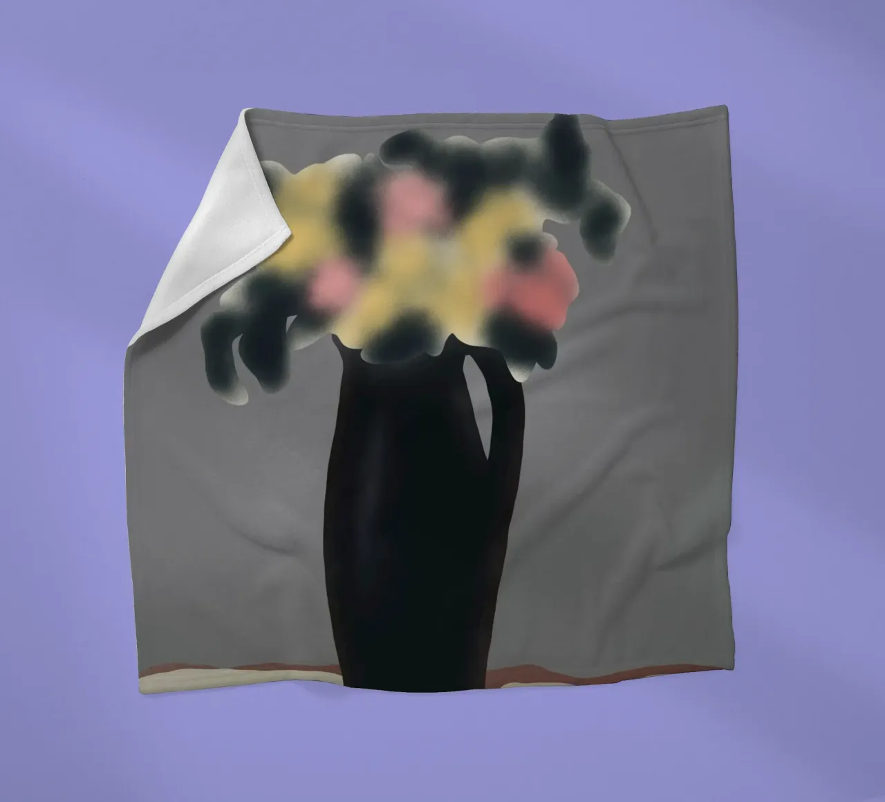 Ebony vase with blurred floral fleece blanket by Little Dean