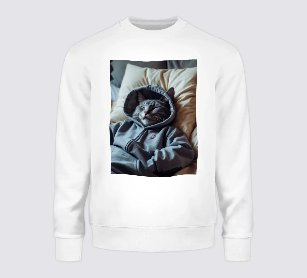 Chat se reposant confortablement dans un sweat à capuche sur un oreiller moelleux sweat de DesignDoodle