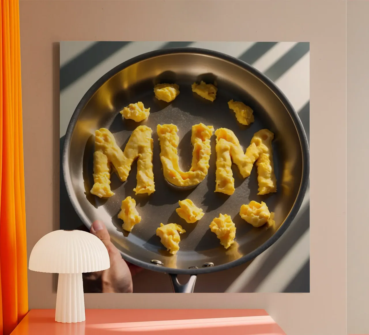 Celebrating Mum with scrambled eggs shaped into letters in a canvas by DesignDoodle