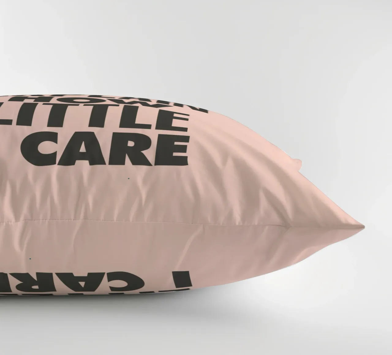 I Can't Even Begin to Explain How Little I Care in Peach decorative cushion by THE MOTIVATED TYPE