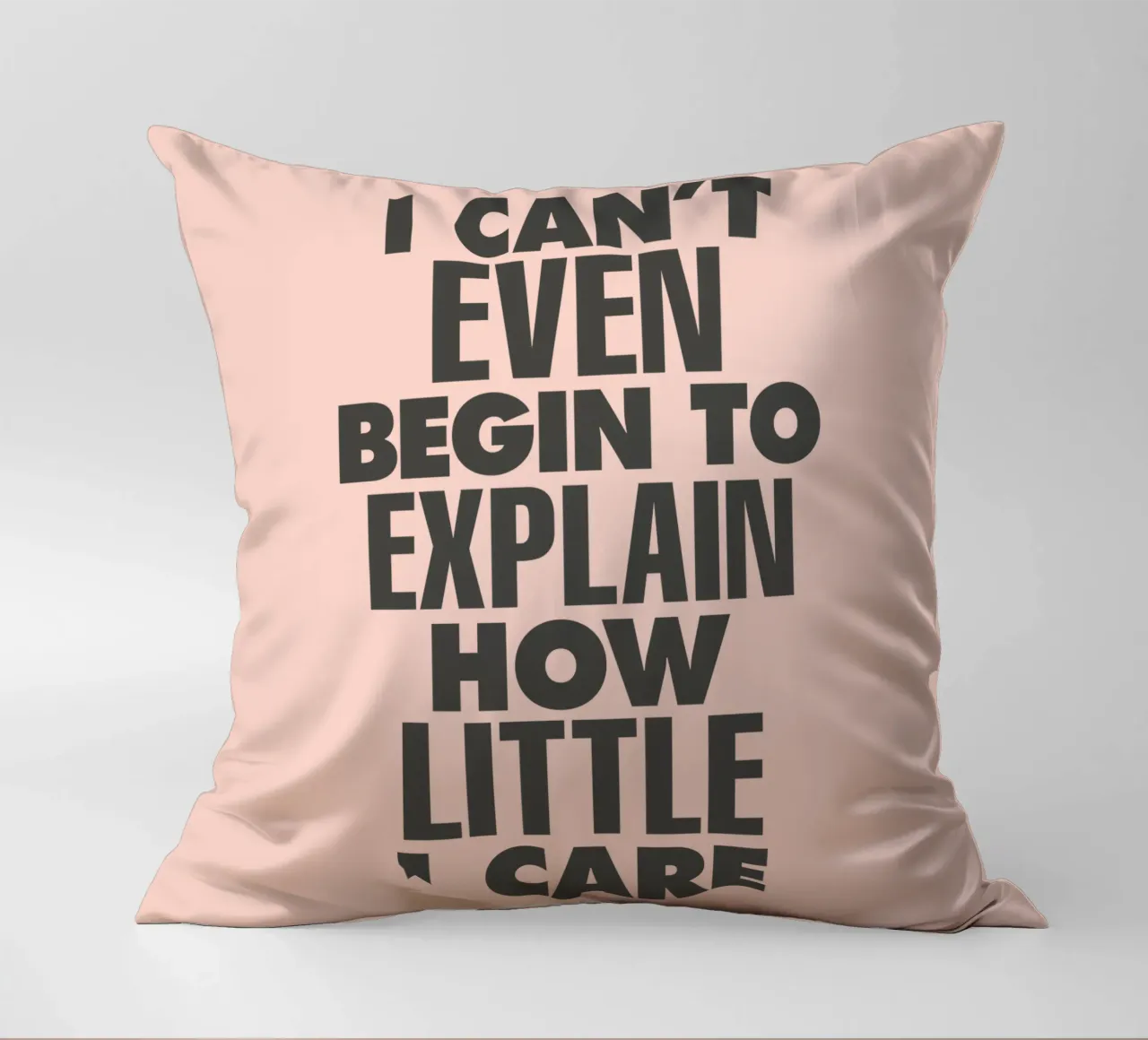 I Can't Even Begin to Explain How Little I Care in Peach decorative cushion by THE MOTIVATED TYPE