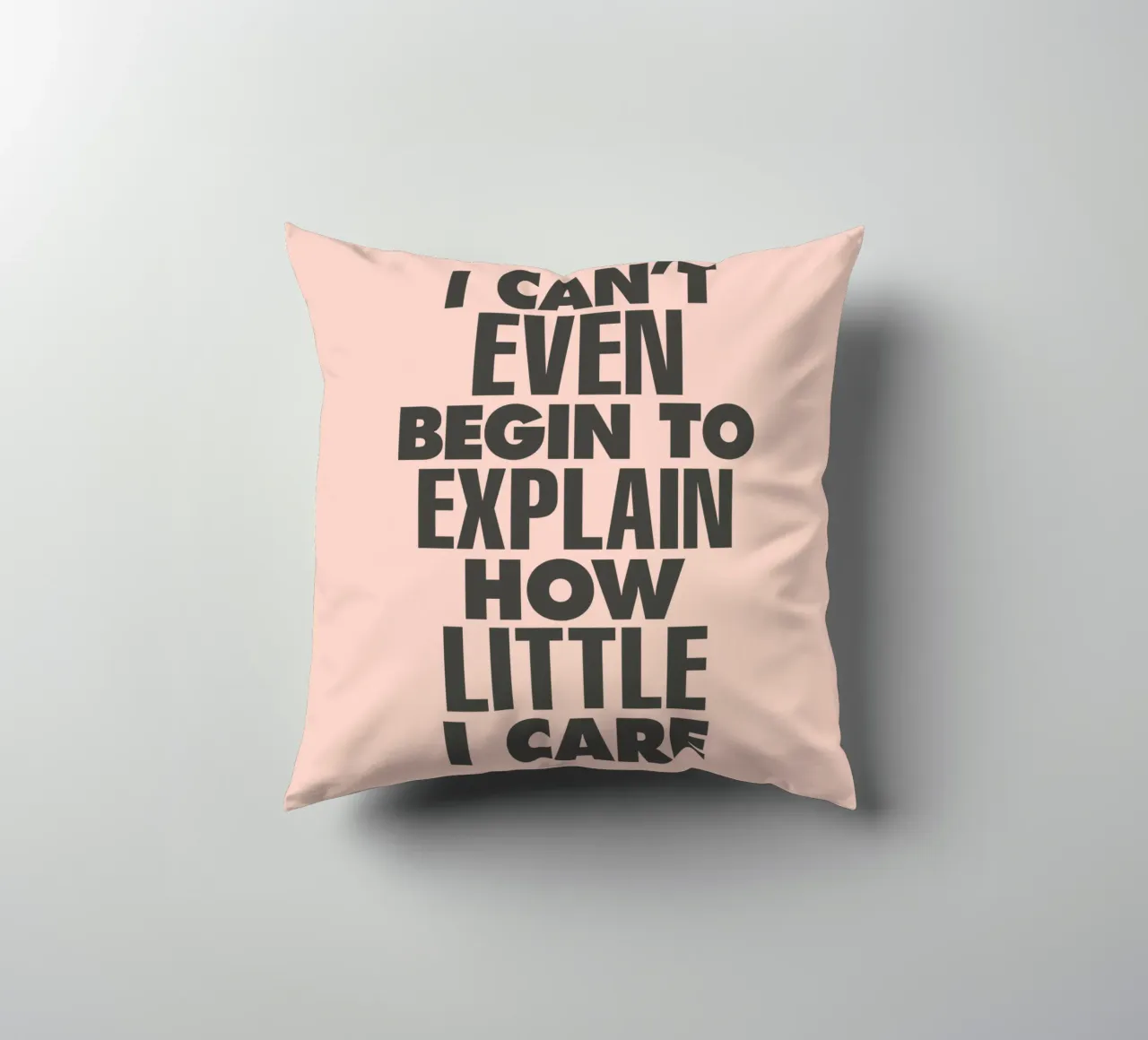 I Can't Even Begin to Explain How Little I Care in Peach decorative cushion by THE MOTIVATED TYPE