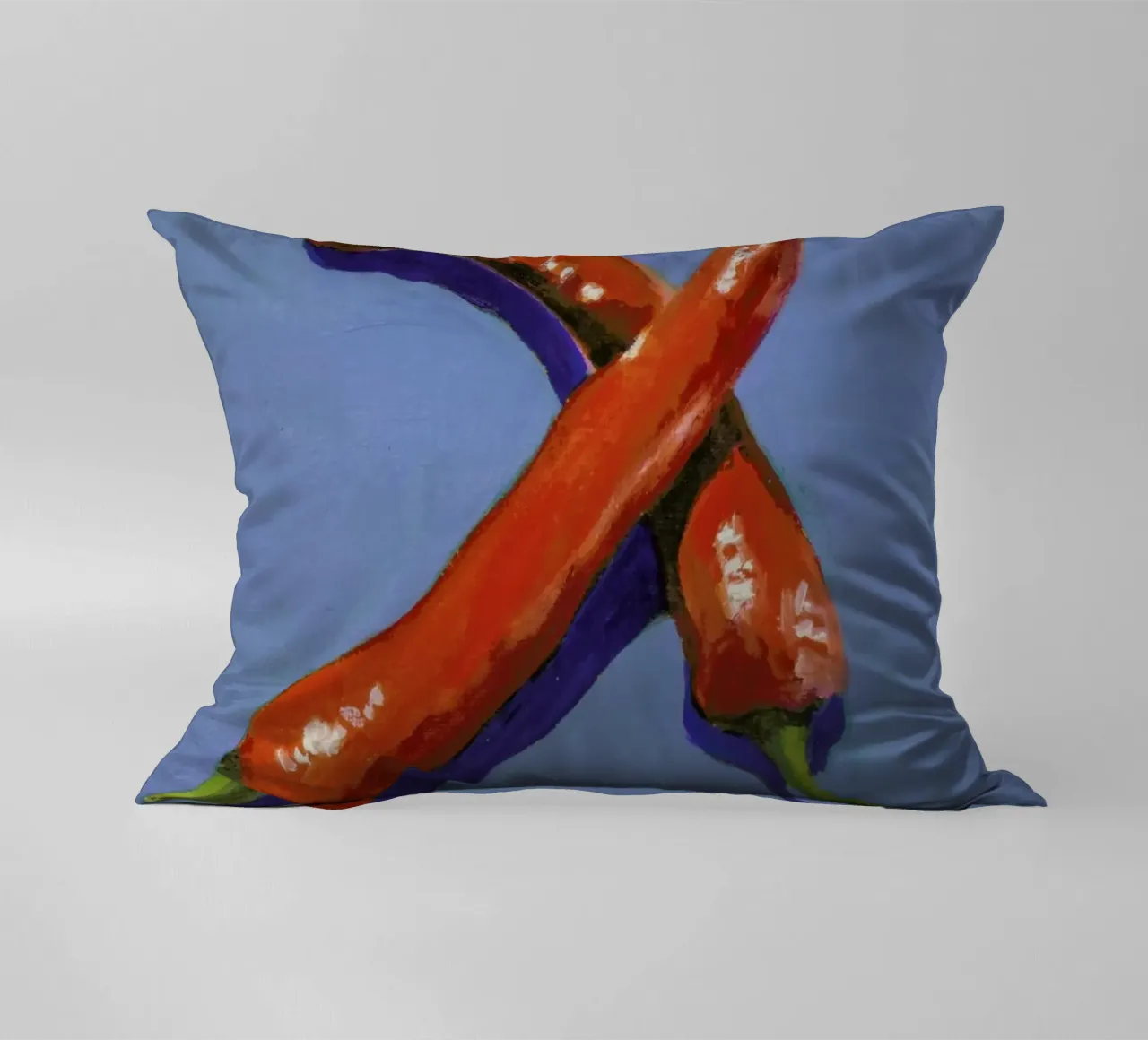 Chillis on Blue decorative cushion by Miche Watkins